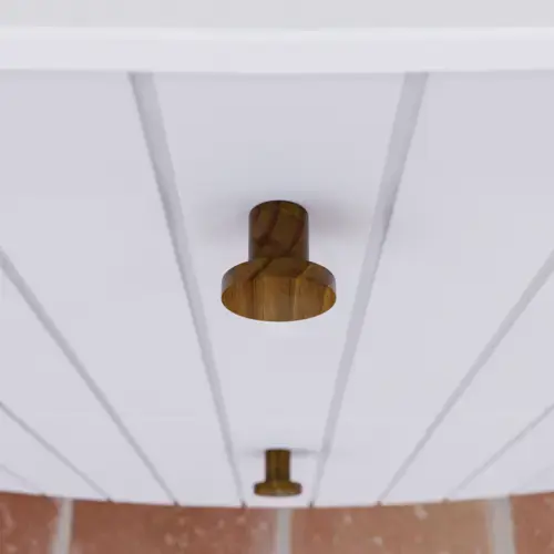 Suuri kylpyhuoneinspiraatio valkoisilla kalusteilla, joissa on urat, elegantit työtasot ja pöytätason altaat, soikeat peilit valoilla, näkyvät palkit ja kuvioidut laatat luovat vintage- ja tyylikkään ilmeen