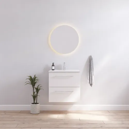 Kylpyhuone inspiraatio kapea valkoinen turhamaisuus yksikkö valkoisilla kahvoilla ja tyylikäs pesuallas kaunis pyöreä peili valo, valkoiset seinät ja puulattia valoisa ja minimalistinen ilme.